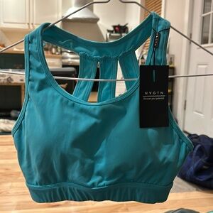 NVGTN size small sports bra. NWT, lagoon blue aqua